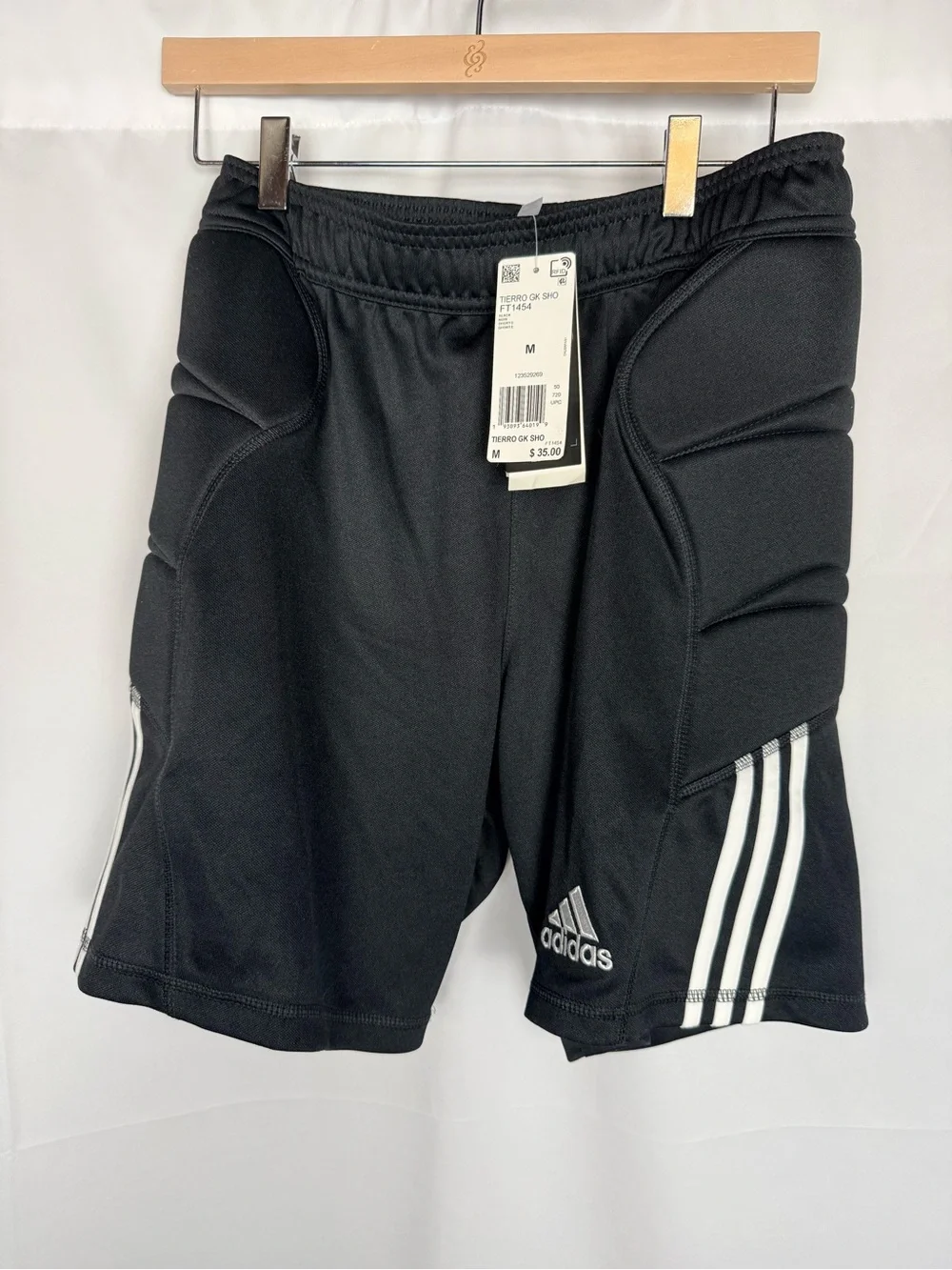 adidas Men’s Black Padded Athletic Shorts with White Three-Stripes